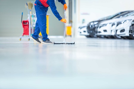 car mechanic repair service center cleaning using mops roll water from epoxy floor car repair service center optimized